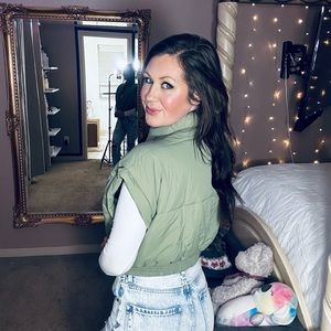 Light olive and black puffer vest. Brand new with tags. Both for $50.00